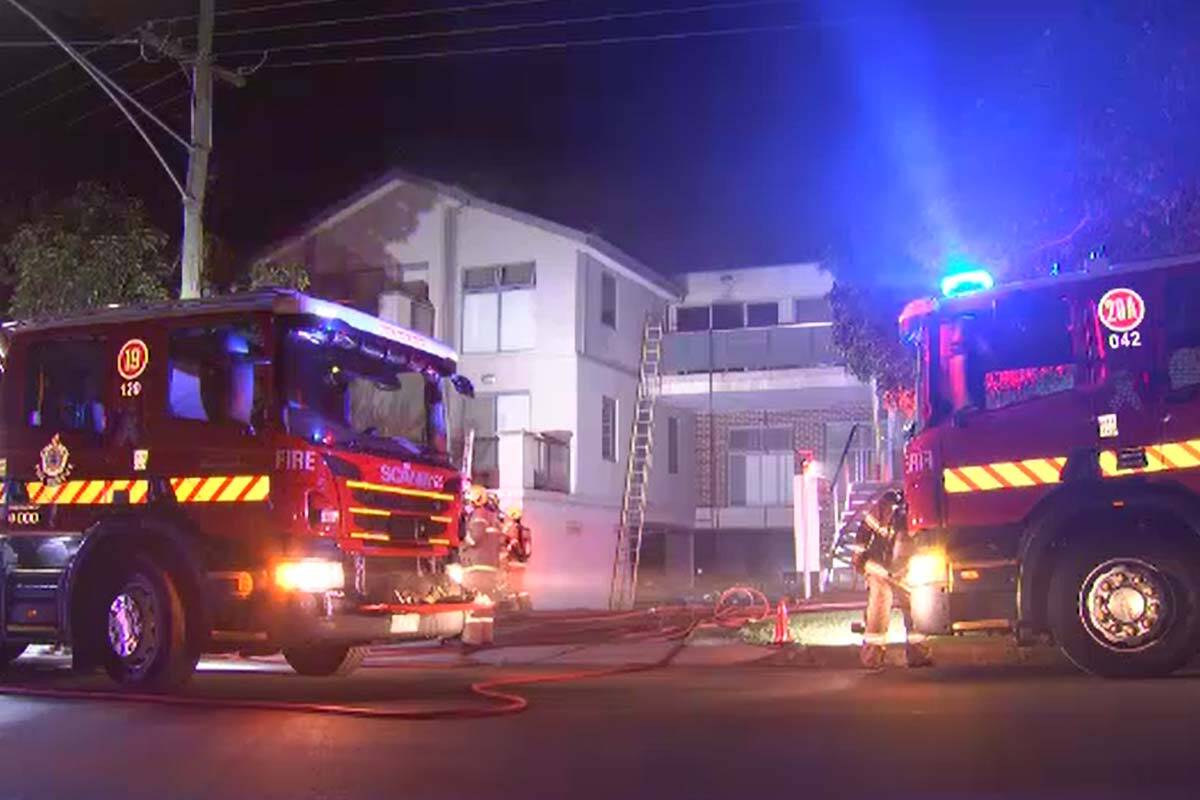 Article image for Trapped residents rescued after Balwyn social housing block fire