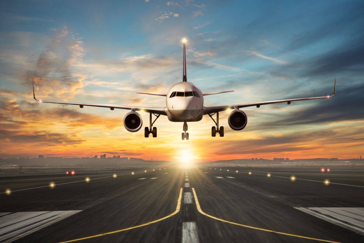 Article image for Plane narrowly misses workers on runway at Melbourne Airport