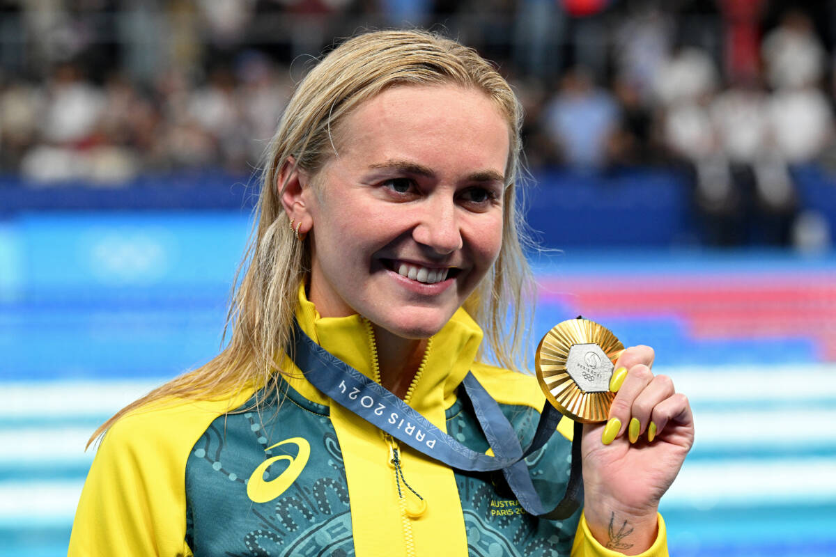 Article image for LISTEN: Titmus defends 400m freestyle crown as Australia STUNS in the pool with two gold medals