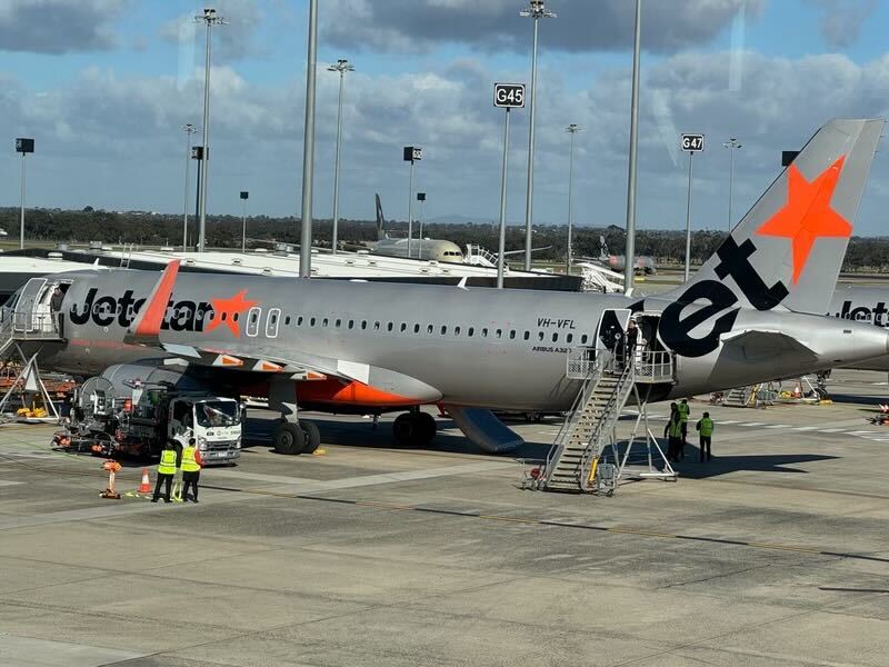 Article image for ‘People were just screaming’: Drama on Jetstar plane as passenger opens emergency door