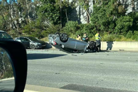 Car flipped on roof in nasty Monash Freeway crash