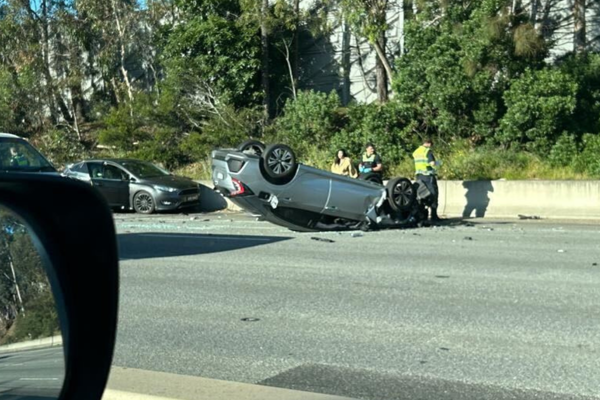 Article image for Car flipped on roof in nasty Monash Freeway crash