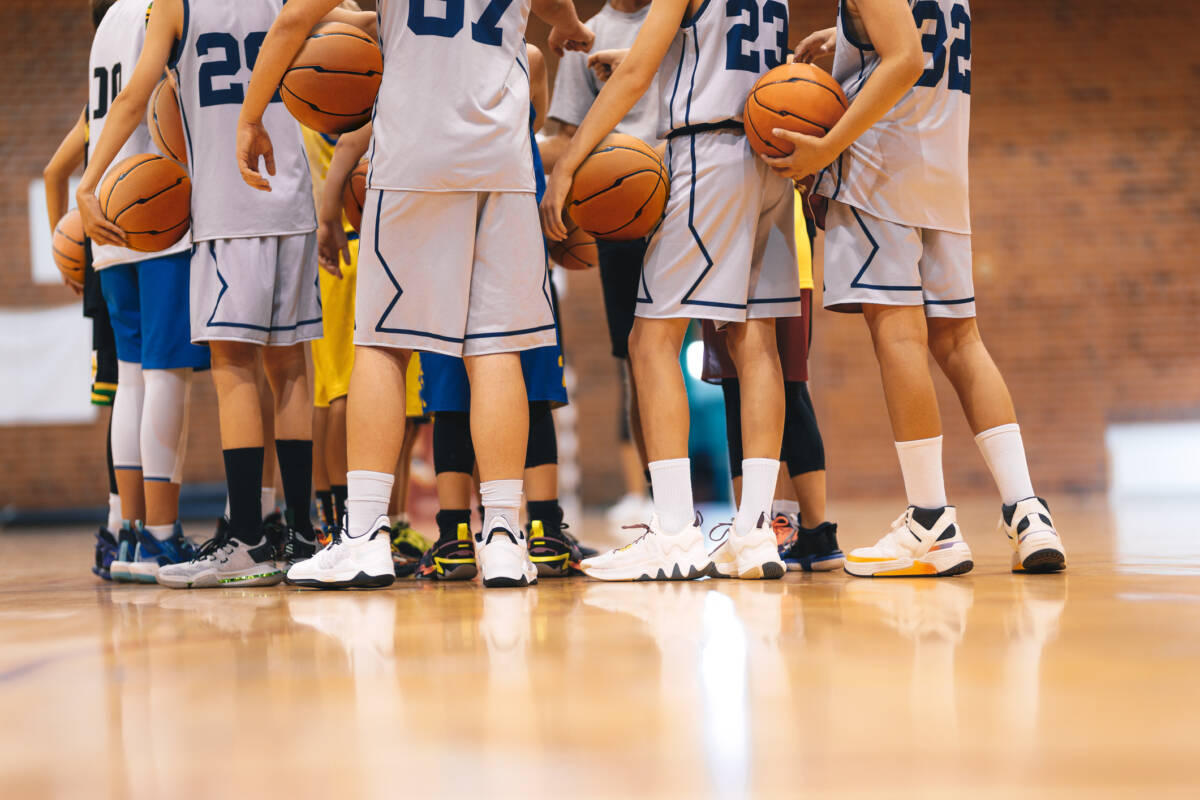 Article image for Tense handshake and shirtfront allegations spark furore in junior basketball match